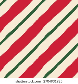 Padrão sem emenda de vetor listrado diagonal brilhante. Moderno, brincalhão, mínimo vermelho e verde mão desenhada doces listras repetem o design no fundo de creme. Telha geométrica festiva para tecidos, invólucro, mídia