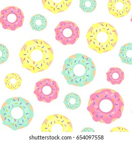 Bright donuts seamless pattern on white background. Cute sweet food baby background. Colorful design for textile, wallpaper, fabric, decor.