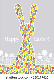 Bright Easter Bunny. Easter card with the figure of the Easter bunny made ??up of colorful painted eggs.
