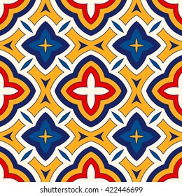 Bright ethnic abstract background. Seamless pattern with symmetric geometric ornament. Ornamental mosaic texture. Vector illustration