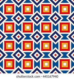 Bright ethnic abstract background. Seamless pattern with symmetric geometric ornament. Ornamental vivid wallpaper. Vector illustration