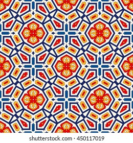 Bright ethnic abstract background. Seamless pattern with symmetric geometric ornament. Ornamental vivid wallpaper. Vector illustration