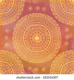 Bright ethnic seamless pattern . Grunge coral red watercolor background with gold pattern. All objects are conveniently grouped on different layers and are easily editable.