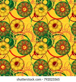 Bright and exotic tribal seamless pattern with mandalas created by means of overlapping circles of light and dark red, green, orange and yellow. Suitable for printing on wrapping paper or cloth