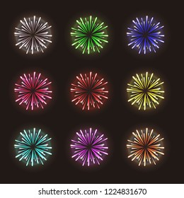 bright firework bursts in several colors with black background