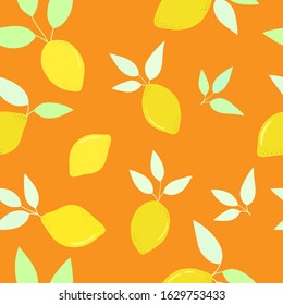 Bright flat yellow lemons with light green leaves on orange background. Seamless summer food pattern. Suitable for wrapping, textile, wallpaper.