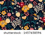 Bright floral print with various hand drawn flowers, leaves, berries on a dark background. Abstract colorful pattern. Vector seamless pattern. Plant flower nature wallpaper. Original design.