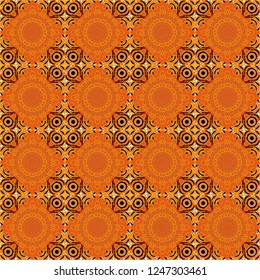 Bright flower. Vector illustration. Seamless pattern illustration for design. Abstract kaleidoscope orange, black and yellow background.