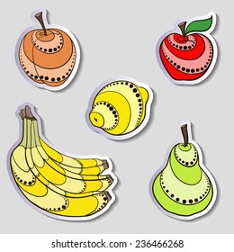 Bright fruit stickers on light gray background