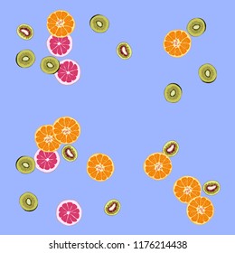 Bright fruity background with orange, grapefruit and kiwi on a blue background.