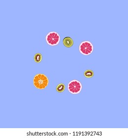 Bright fruity background with orange, grapefruit and kiwi on a blue background.