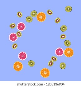 Bright fruity background with orange, grapefruit and kiwi on a blue background.