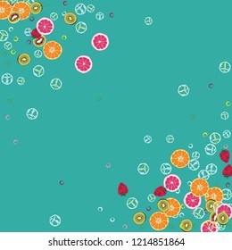 Bright fruity background with orange, grapefruit, strawberries and kiwi on a blue background.