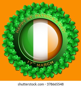 Bright and glossy button or badge with traditional St.Patrick's day festive symbol. Irish national flag enclosed in clover leaf wreath. EPS10 vector illustration.