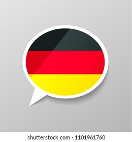 Bright glossy sticker in speech bubble shape with Germany flag, german language concept on gray