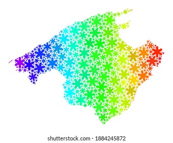 Bright gradient mosaic of Majorca map created for Christmas holidays. Majorca map mosaic is organized of colorful snowflakes. Designed for New Year ads.