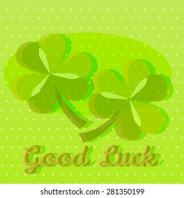 Bright green good luck greeting card template with two shamrocks on dotted background with text space