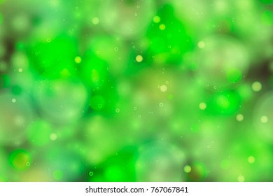 Bright green magic light in the dark, abstract background