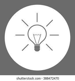 Bright lamp bulb. Vector icon grey and white
