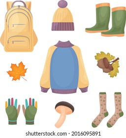 A bright large set consisting of autumn accessories, a warm sweater and hat, rubber boots, gloves, warm socks, as well as a mushroom, a yellow maple leaf and ripe acorns. Autumn symbols. Vector