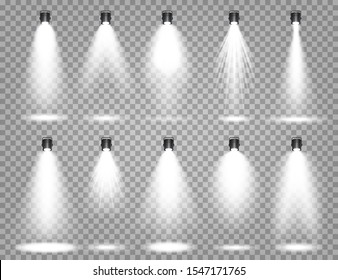 Bright light beam. Vector spotlight set. 
 Transparent realistic effect. Stage lighting. Illuminated studio spotlights.