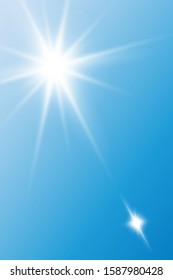 Bright light. Sun flare. Explosion of colors in the blue sky.