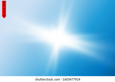 Bright light. Sun flare. Explosion of colors in the blue sky.