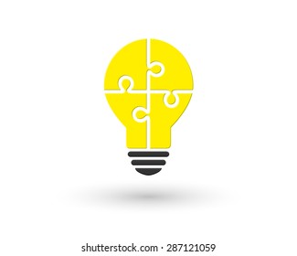 Bright lightbulb made of puzzle as idea concept