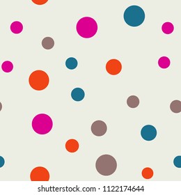 Bright memphis style polka dots seamless pattern on a light background.