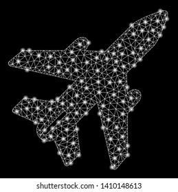 Bright mesh airplane with glow effect. Shiny wire frame polygonal mesh in vector format on a black background. Abstract 2d mesh designed with triangular lines, round dots, glossy flash spots.