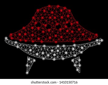 Bright mesh alien spaceship with lightspot effect. Shiny wire carcass triangular network in vector format on a black background. Abstract 2d mesh designed with triangular lines, round dots,