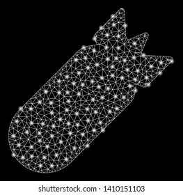 Bright mesh aviation bomb with glare effect. Shiny wire frame polygonal mesh in vector format on a black background. Abstract 2d mesh created from polygonal grid, dots, glossy light spots.