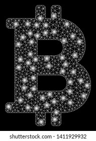 Bright mesh Bitcoin with glare effect. Abstract illuminated model of Bitcoin icon. Shiny wire carcass polygonal mesh Bitcoin abstraction in vector format on a black background.