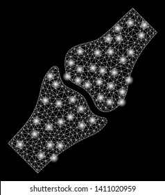 Bright mesh bone joint with glow effect. Abstract illuminated model of bone joint icon. Shiny wire carcass triangular mesh bone joint abstraction in vector format on a black background.