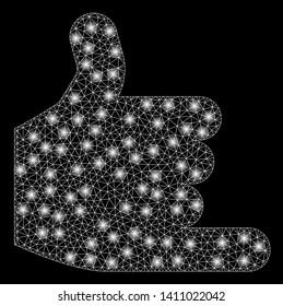Bright mesh call with lightspot effect. Abstract illuminated model of call icon. Shiny wire frame triangular mesh call abstraction in vector format on a black background.