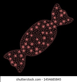 Bright mesh candy with glare effect. Abstract illuminated model of candy icon. Shiny wire frame triangular mesh candy abstraction in vector format on a black background.
