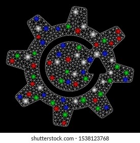 Bright mesh cogwheel rotation direction with glare effect. White wire carcass triangular mesh in vector format on a black background. Abstract 2d mesh designed with triangular lines, round dots,
