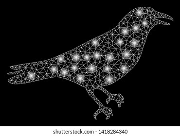 Bright mesh crow with glare effect. Abstract illuminated model of crow icon. Shiny wire frame polygonal mesh crow abstraction in vector format on a black background.