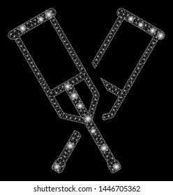 Bright mesh crutches with glow effect. Abstract illuminated model of crutches icon. Shiny wire carcass triangular mesh crutches abstraction in vector format on a black background.