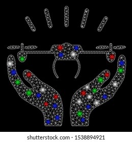 Bright mesh drone launch hands with lightspot effect. White wire carcass triangular mesh in vector format on a black background. Abstract 2d mesh designed with polygonal grid, points,