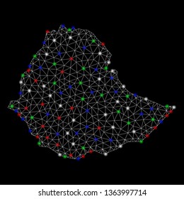 Bright mesh Ethiopia map with glare effect. Wire carcass polygonal network in vector format on a black background. Abstract 2d mesh designed with triangular lines, points, colored glare spots.