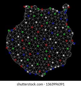 Bright mesh Gran Canaria map with lightspot effect. Wire frame triangular mesh in vector format on a black background. Abstract 2d mesh created from triangular lines, small circle,
