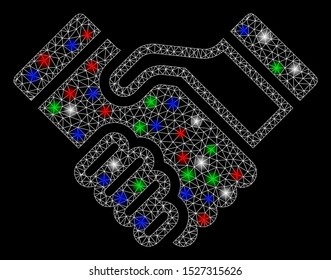 Bright mesh handshake with glare effect. White wire frame triangular mesh in vector format on a black background. Abstract 2d mesh built from triangular lines, points, colored light spots.