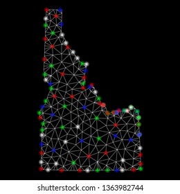 Bright mesh Idaho State map with glare effect. Wire frame polygonal mesh in vector format on a black background. Abstract 2d mesh designed with triangular lines, round dots, colored flash spots.