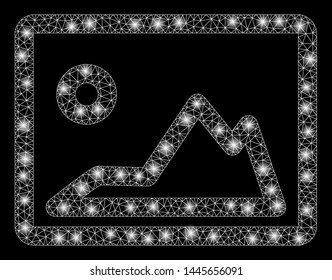 Bright mesh landscape image with glow effect. Abstract illuminated model of landscape image icon. Shiny wire carcass polygonal mesh landscape image. Vector abstraction on a black background.