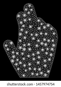 Bright mesh manage hand with glitter effect. Abstract illuminated model of manage hand icon. Shiny wire frame triangular mesh manage hand. Vector abstraction on a black background.