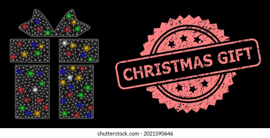 Helles Netz Geschenk mit Leuchtpunkten und Weihnachtsgeschenk unlean Rosette Stempel. Illuminierte Vektorgitter, die aus Geschenkpiktogramm entstanden sind. Rosa Briefmarke enthält Weihnachtsgeschenktitel in Rosette.