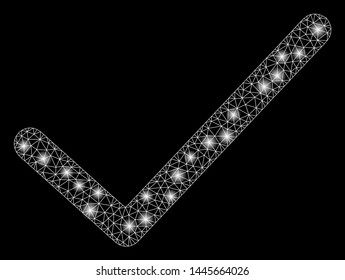 Bright mesh ok tick with glare effect. Abstract illuminated model of ok tick icon. Shiny wire carcass polygonal mesh ok tick. Vector abstraction on a black background.