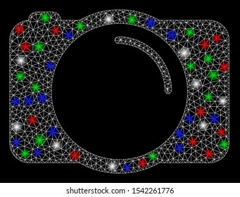 Bright mesh photo camera with glow effect. White wire carcass triangular mesh in vector format on a black background. Abstract 2d mesh designed with polygonal grid, dots, colored flare spots.