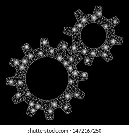 Bright mesh reduction gears with glow effect. Abstract illuminated model of reduction gears icon. Shiny wire carcass polygonal mesh reduction gears. Vector abstraction on a black background.